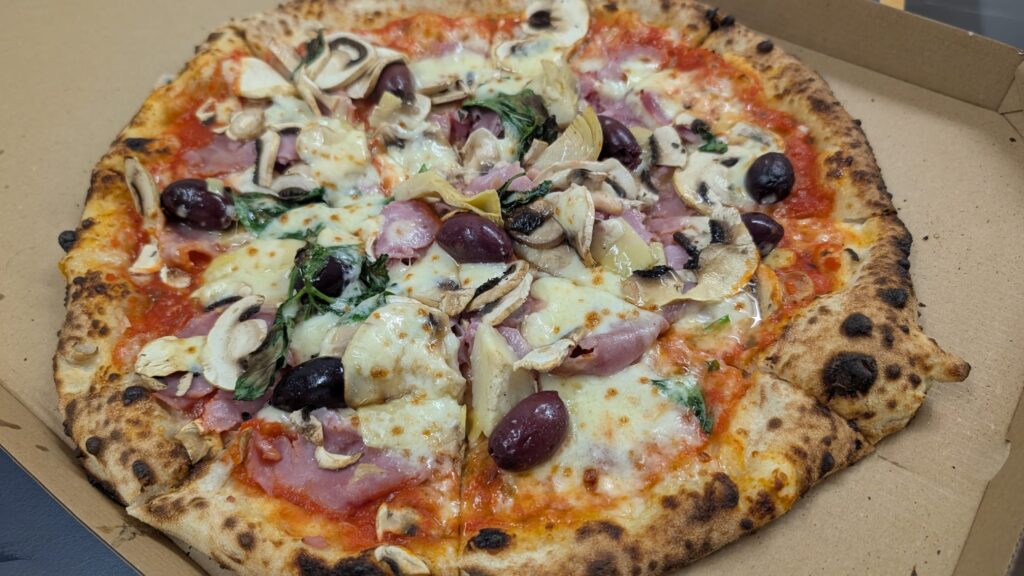 Neapolitanische Holzofenpizza von unserem Pizza-Catering